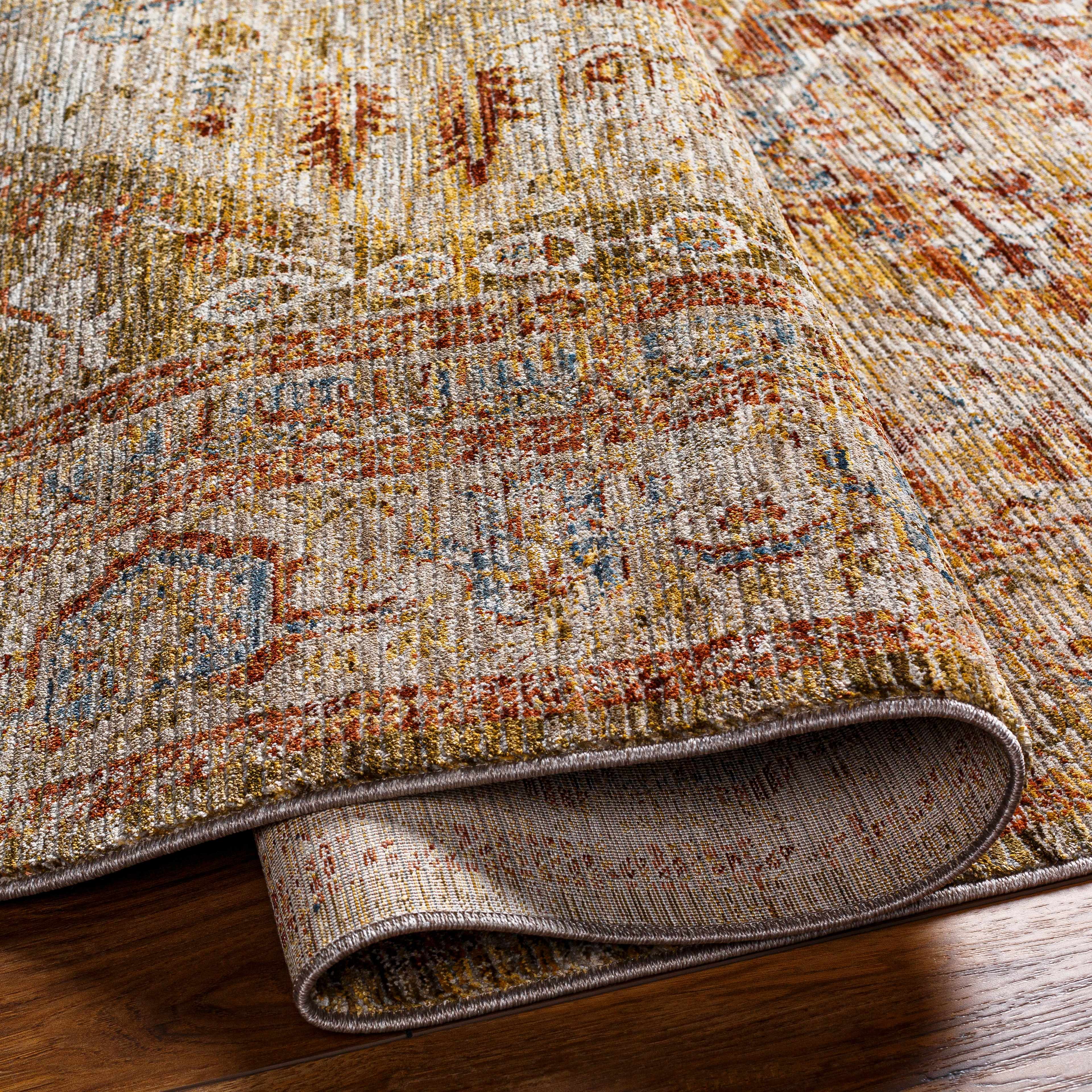 Alois Tan Rich Textured Traditional Rug