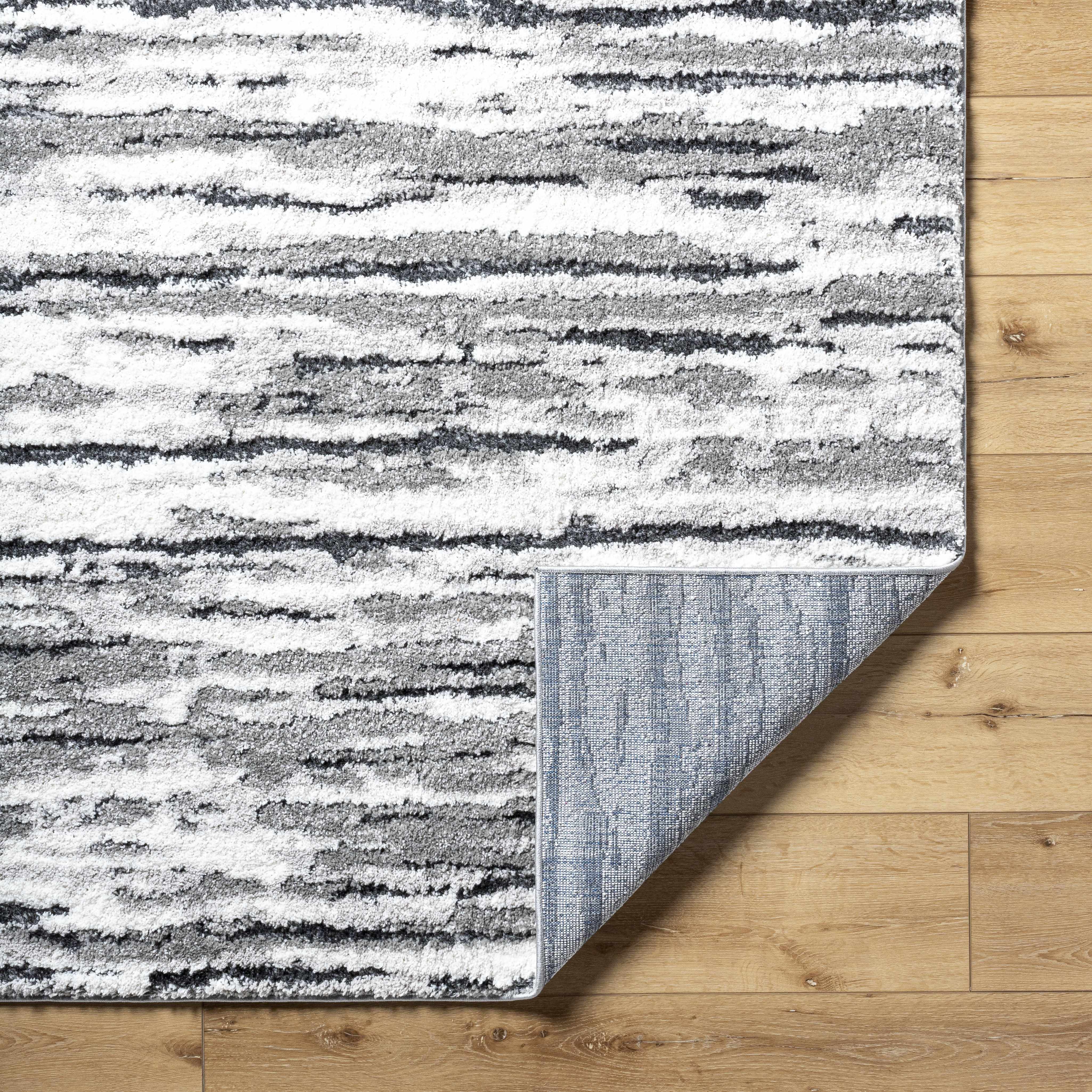Vembo Area Rug